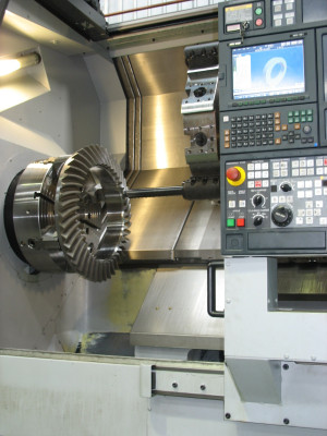 CNC gear cutting a spiral bevel gear